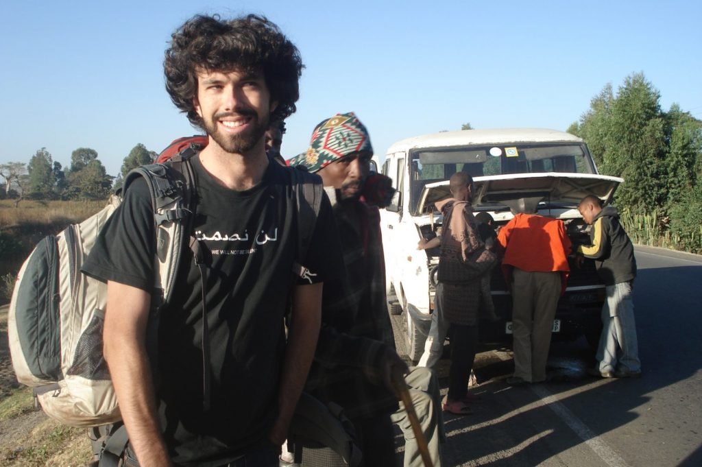 Alan standing next to the broken-down bus outside of Awassa, Ethiopia