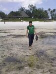 Randi walking on the beach in Watamu, Kenya