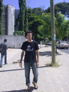 Alan walking on the street in Dar es Salaam