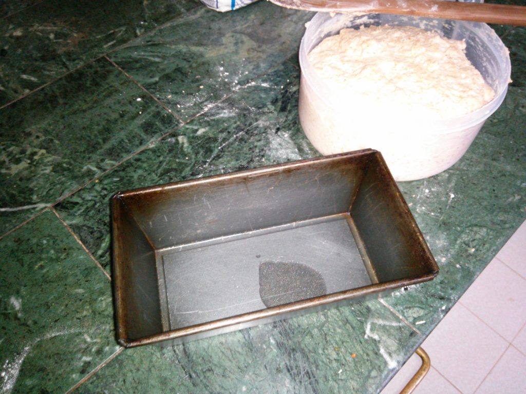 Oiling the baking tin